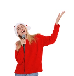 Photo of Happy woman in Santa Claus hat singing with microphone on white background. Christmas music