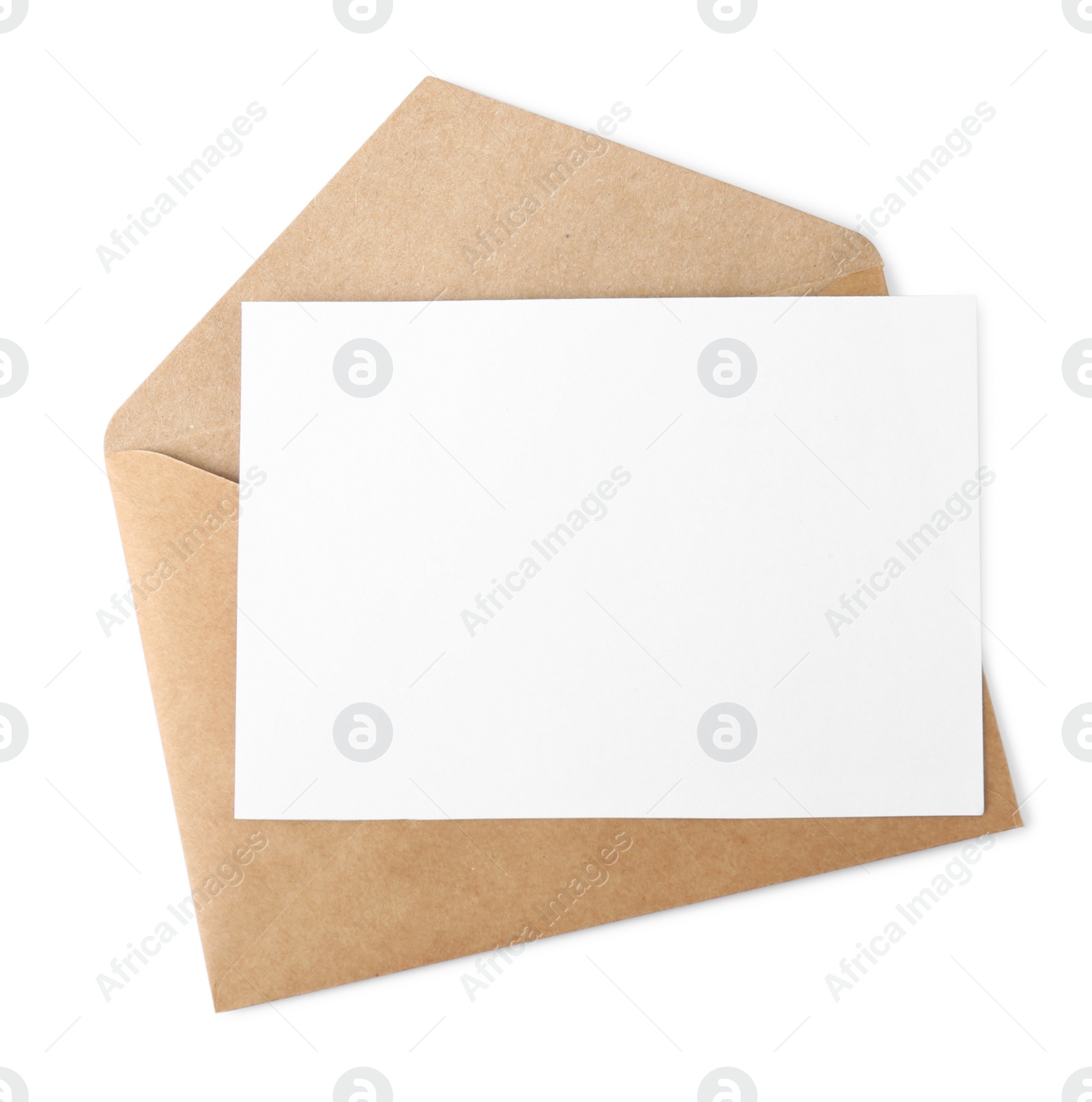 Photo of Brown envelope with blank letter on white background, top view