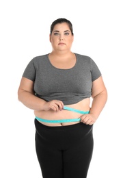 Photo of Overweight woman with measuring tape on white background