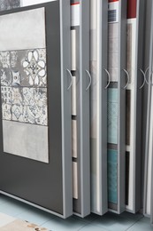 Photo of Many different samples of tiles on display in store