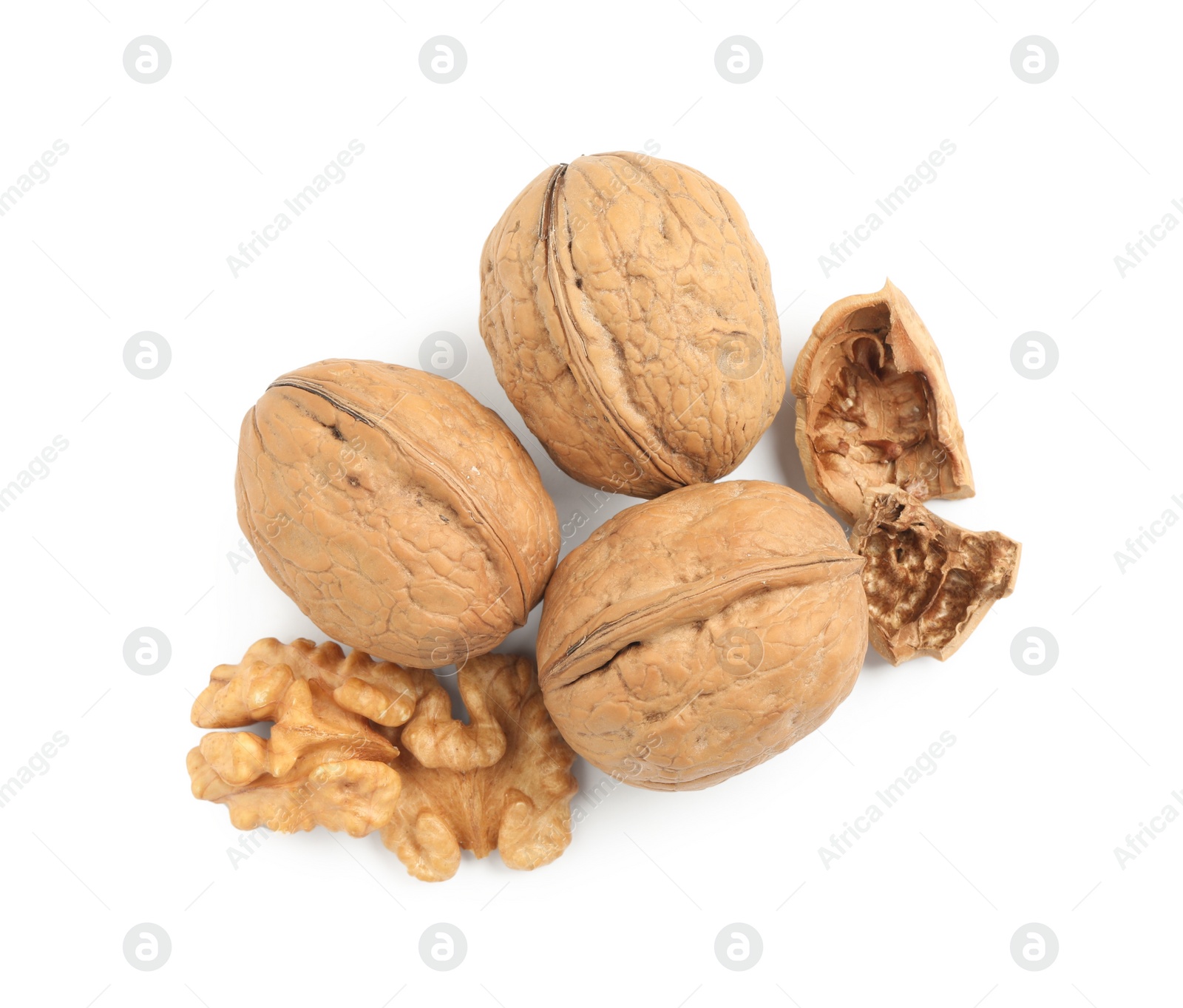 Photo of Fresh ripe walnuts and shell on white background, top view