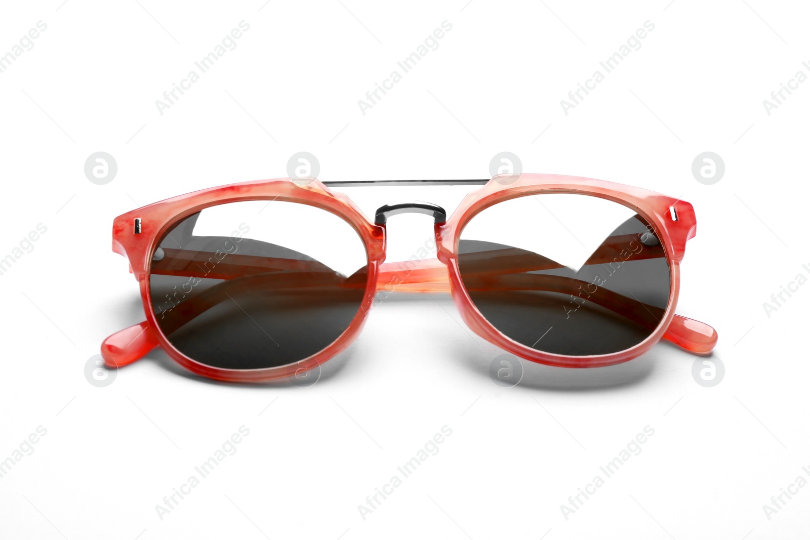 Photo of Stylish sunglasses on white background. Fashionable accessory