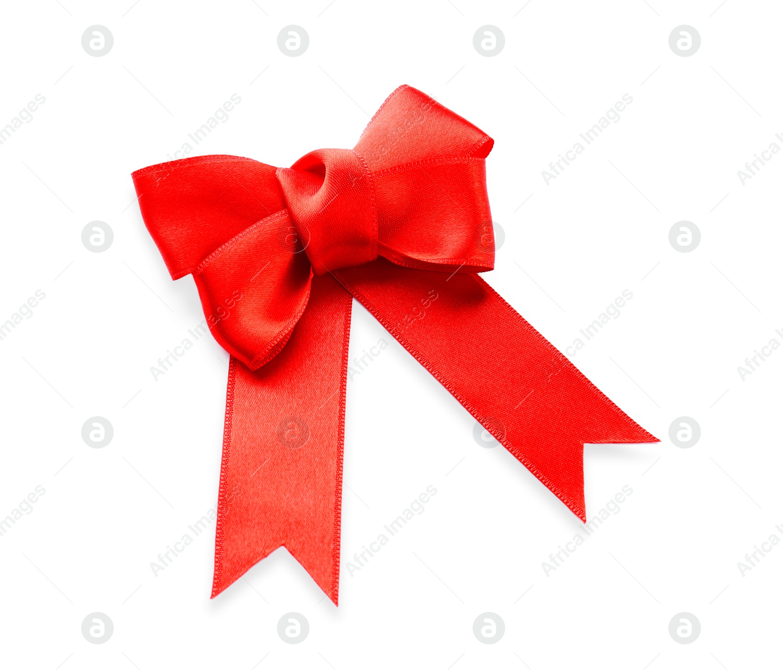 Photo of Red ribbon bow on white background, top view