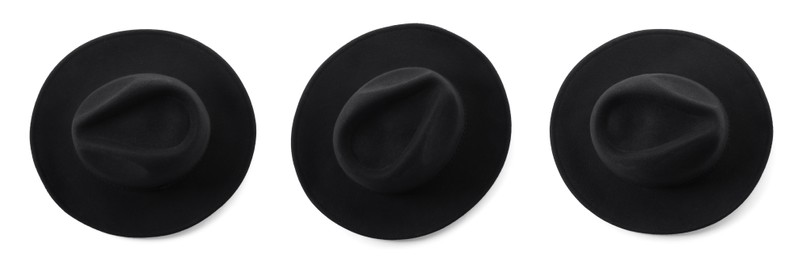 Set with stylish black hats on white background, top view. Banner design