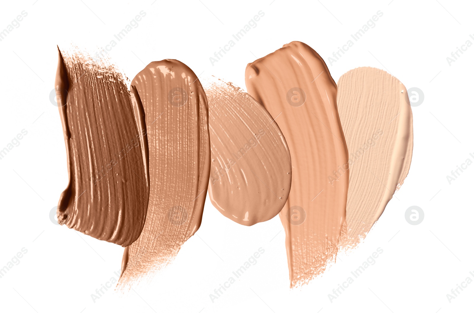 Image of Foundation of various shades for different skin tones isolated on white, top view. Set of samples