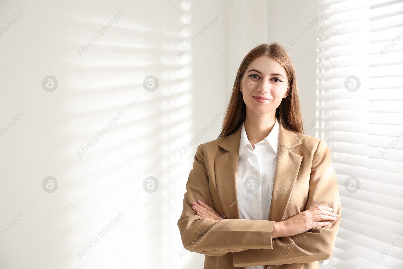 Photo of Portrait of beautiful young businesswoman in office