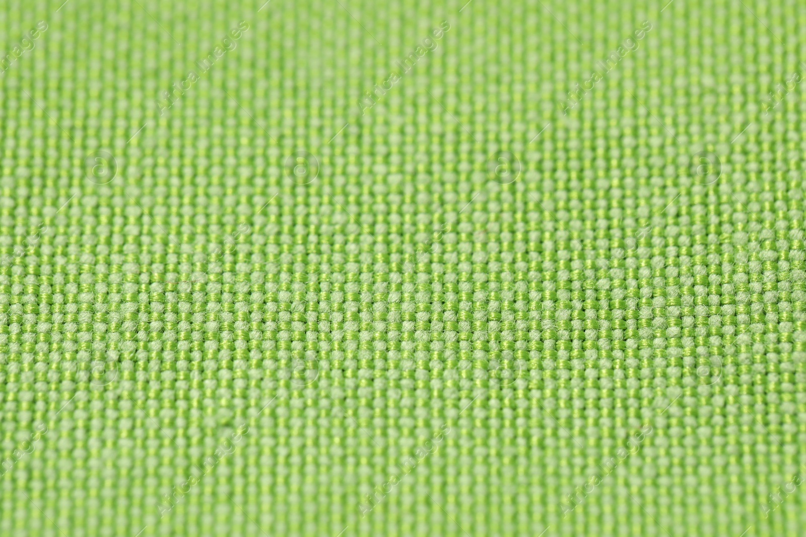 Photo of Texture of green fabric as background, closeup