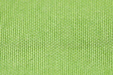 Photo of Texture of green fabric as background, closeup