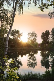 Photo of Picturesque view of lake at sunrise. Morning landscape