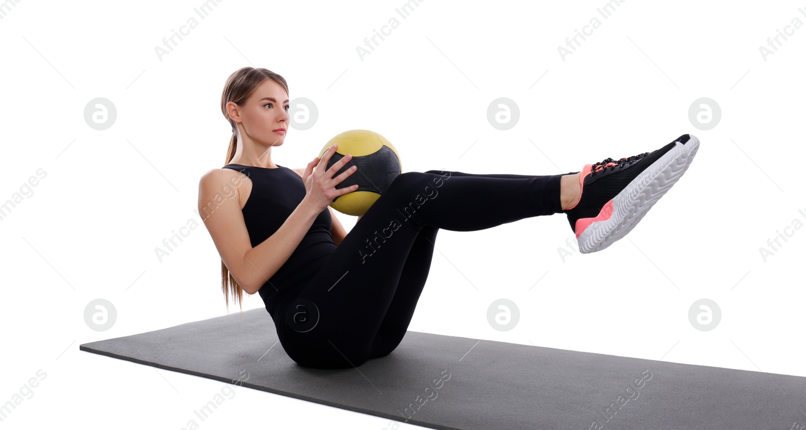 Photo of Athletic woman doing exercise with medicine ball isolated on white