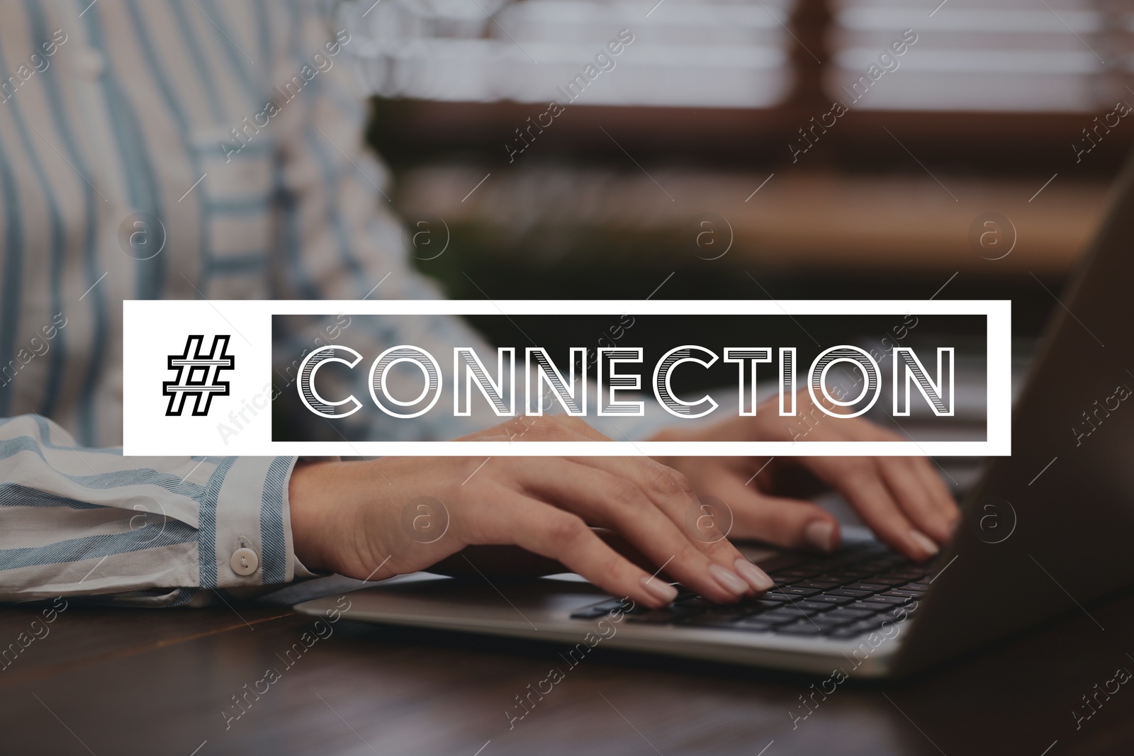 Image of Hashtag Connection. Woman working on laptop at wooden table, closeup