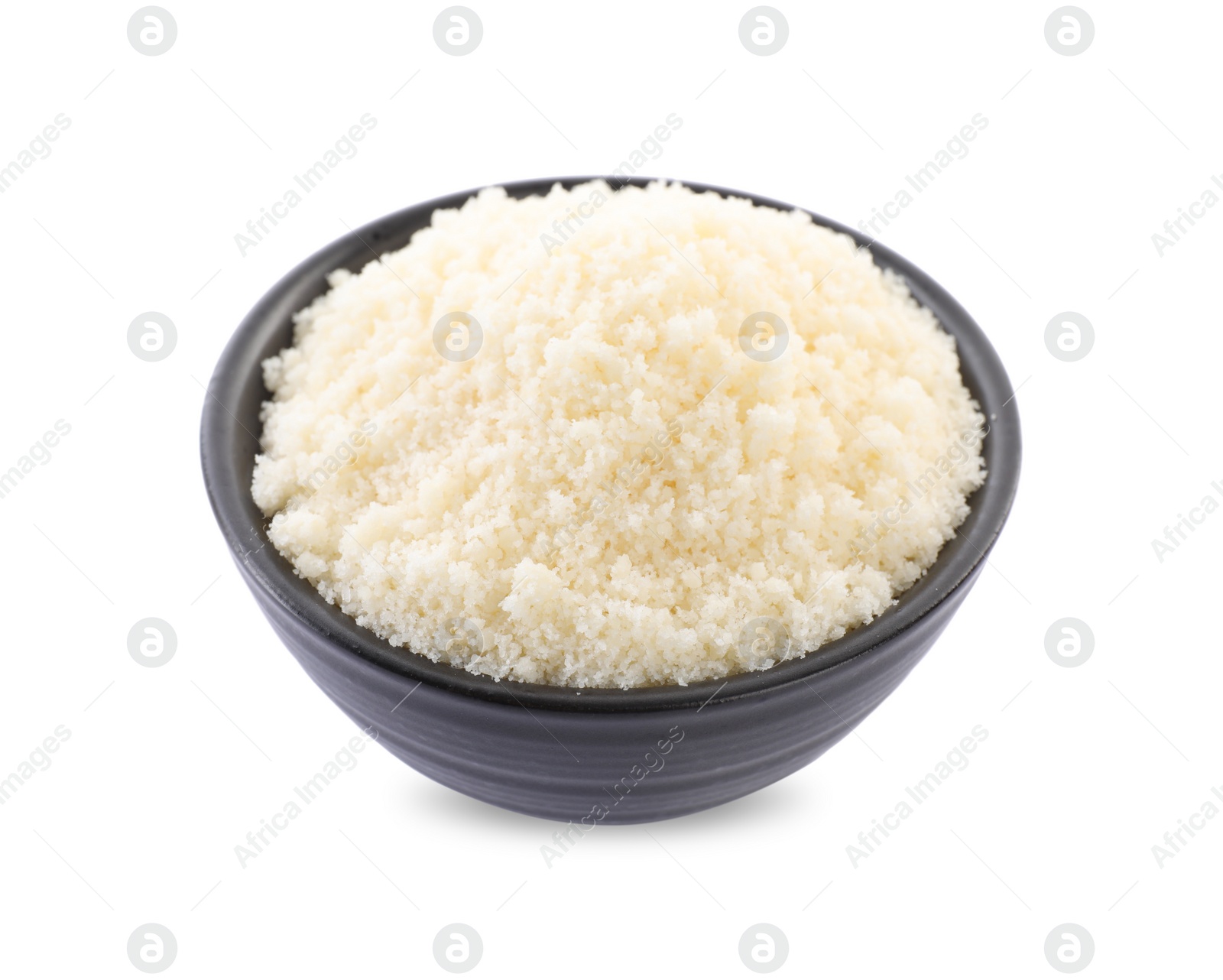 Photo of Bowl with grated parmesan cheese isolated on white