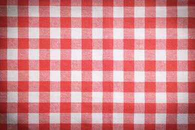 Image of Red and white tablecloth as background, vignette effect