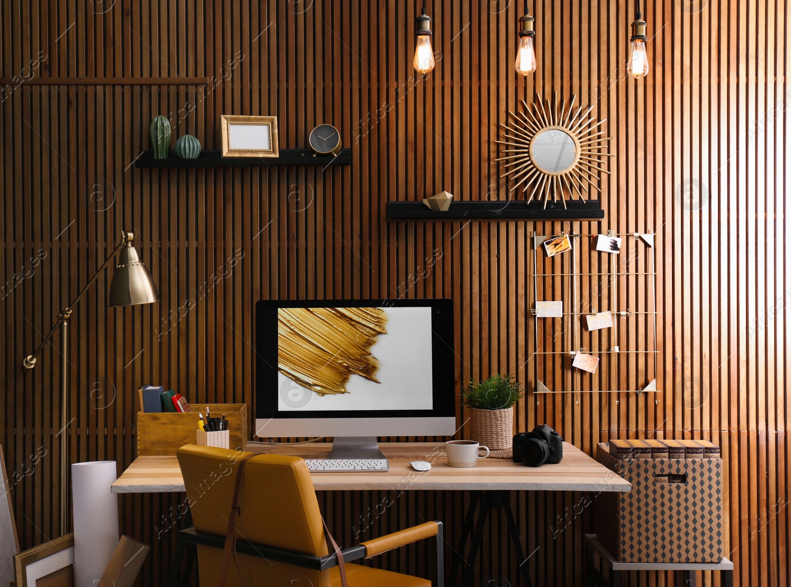 Photo of Modern computer on desk in room. Home workplace