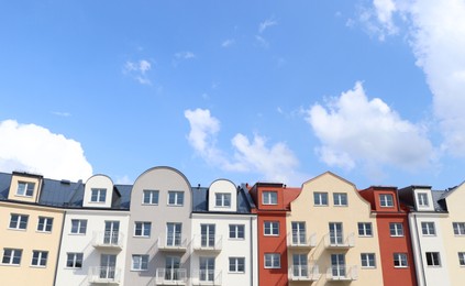Beautiful view of modern houses against blue sky