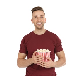 Man with popcorn during cinema show on white background