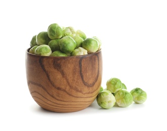 Photo of Bowl of fresh Brussels sprouts isolated on white
