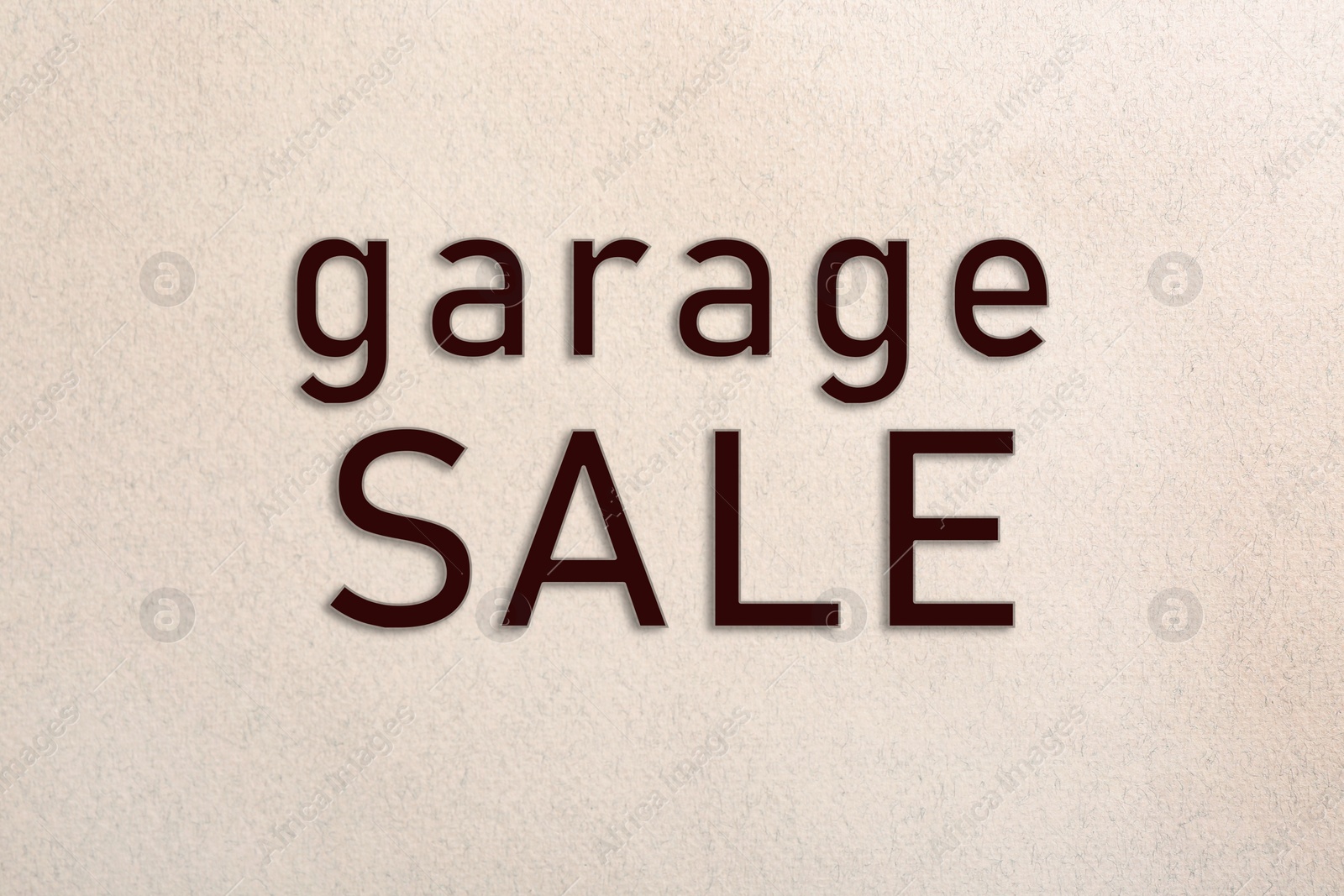 Image of Words Garage Sale on sheet of paper, top view