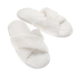 Photo of Pair of soft fluffy slippers on white background