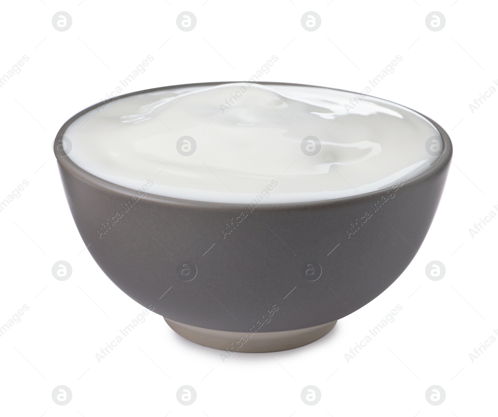 Photo of Ceramic bowl with delicious organic yogurt isolated on white