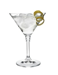 Glass of classic martini cocktail with ice cubes and lemon zest on white background