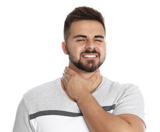 Photo of Man suffering from throat pain on white background