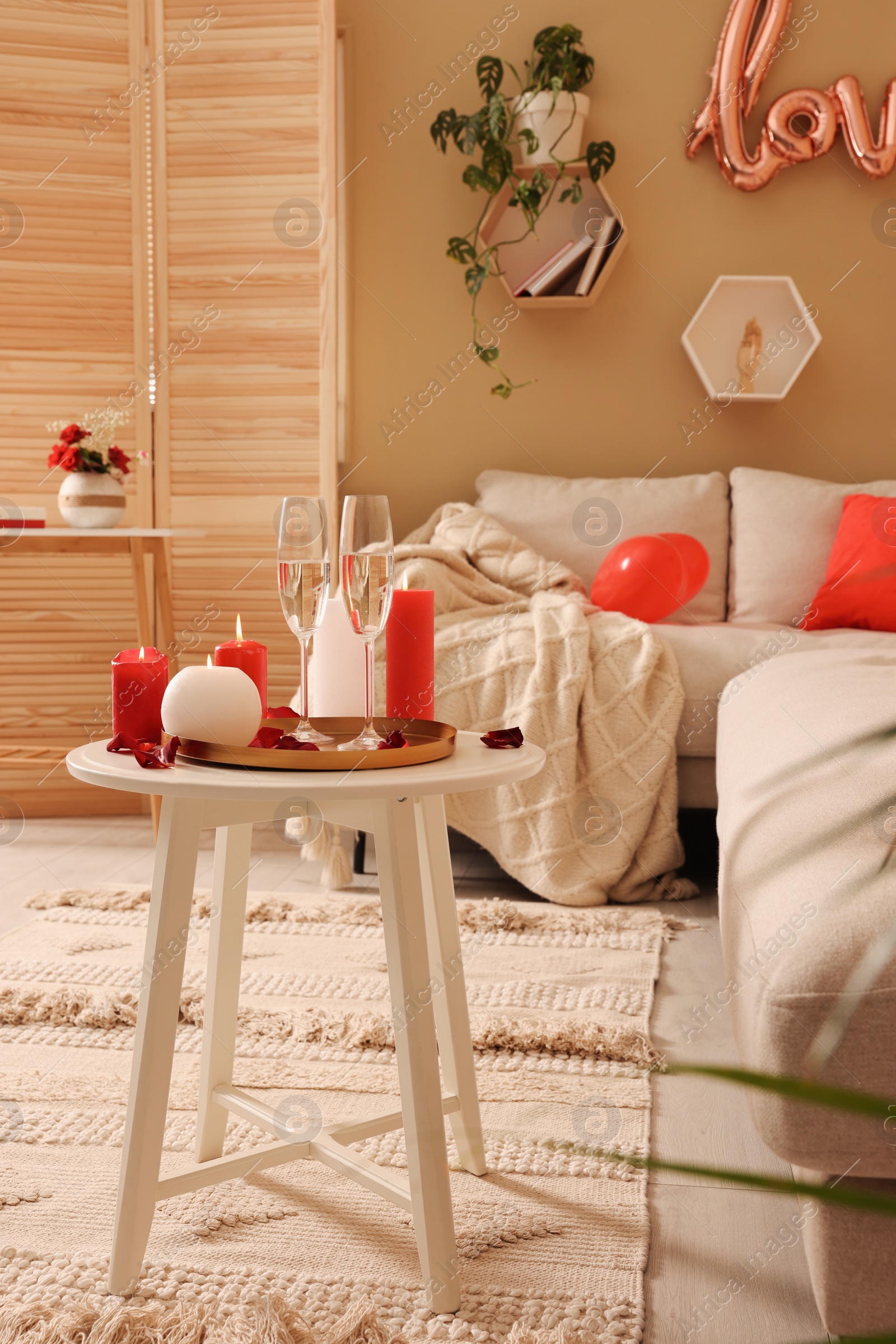 Photo of Cozy room decorated for Valentine's Day. Interior design