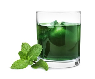 Photo of Delicious mint liqueur with ice cubes and fresh leaves isolated on white