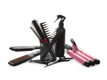 Different professional hairdresser tools on white background