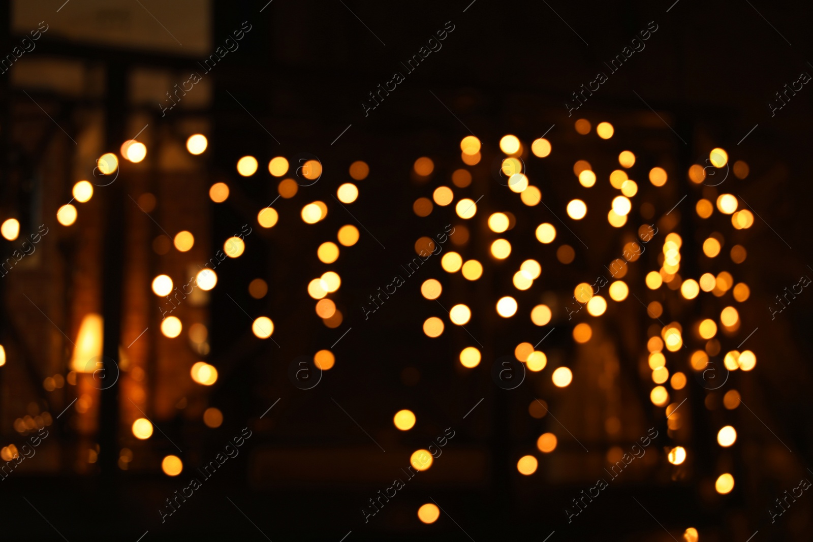 Photo of Beautiful street lights at night. Bokeh effect