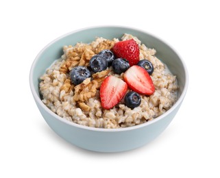 Photo of Tasty oatmeal with strawberries, blueberries and walnuts in bowl isolated on white