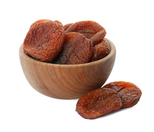 Photo of Wooden bowl with tasty dried apricots isolated on white