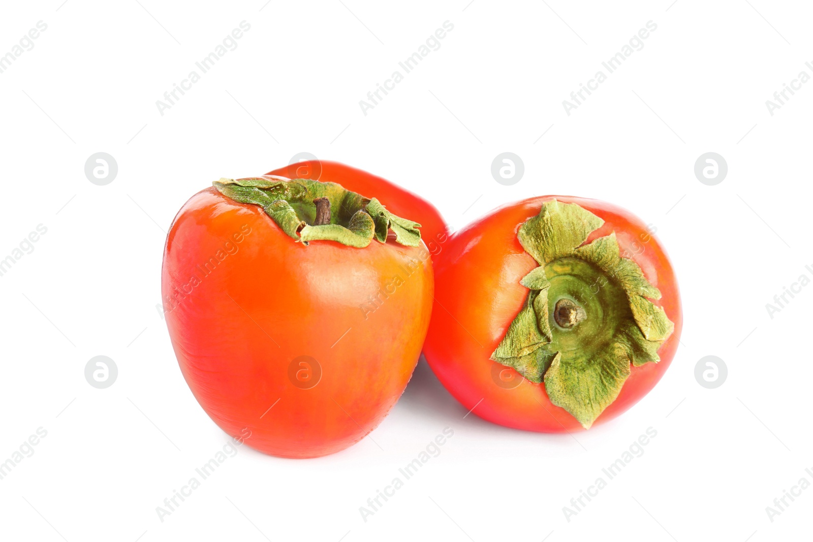 Photo of Delicious fresh ripe persimmons isolated on white