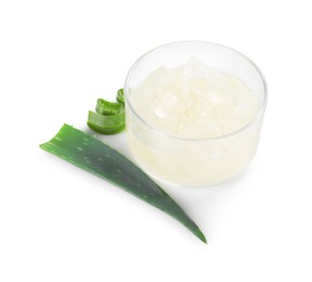 Photo of Aloe vera gel and slices of plant isolated on white