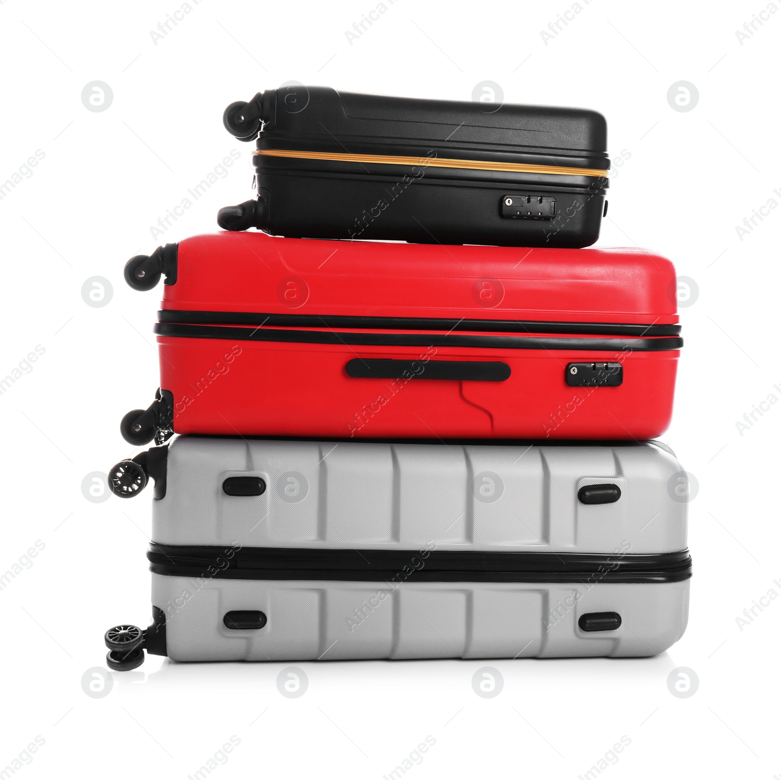 Photo of Modern suitcases for travelling on white background