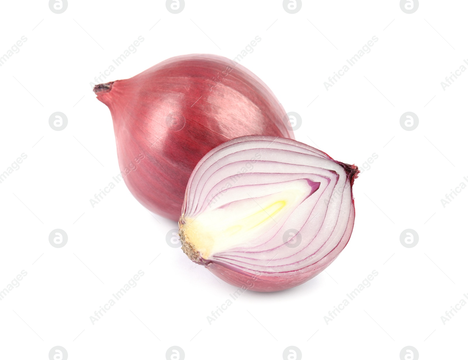 Photo of Fresh whole and cut red onions on white background