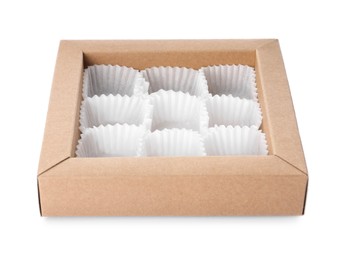 Photo of Empty box of chocolate sweets with candy paper cups isolated on white