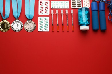 Photo of Flat lay composition with drugs on red background, space for text. Doping control