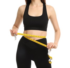 Woman with measuring tape showing her slim body on white background, closeup