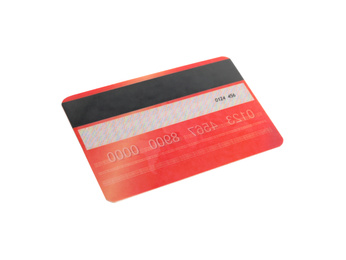 Photo of Red plastic credit card isolated on white
