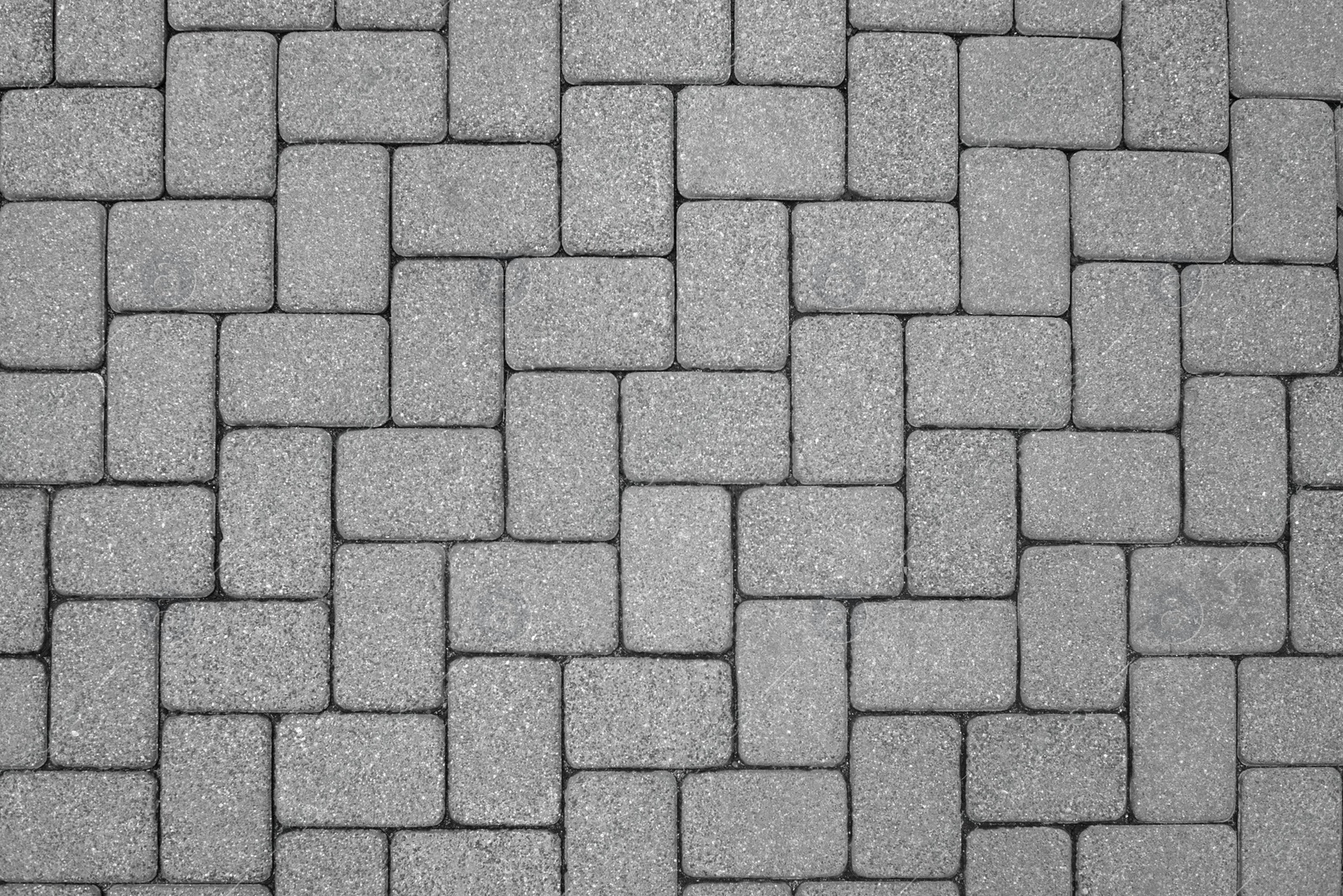 Photo of View on stone sidewal, top view. Footpath covering