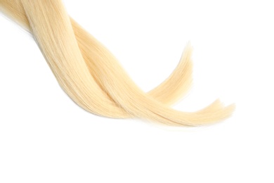 Photo of Locks of healthy blond hair on white background