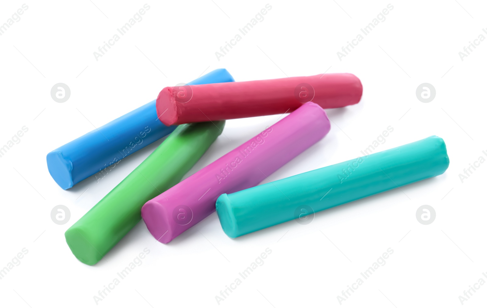 Photo of Many different colorful plasticine pieces on white background