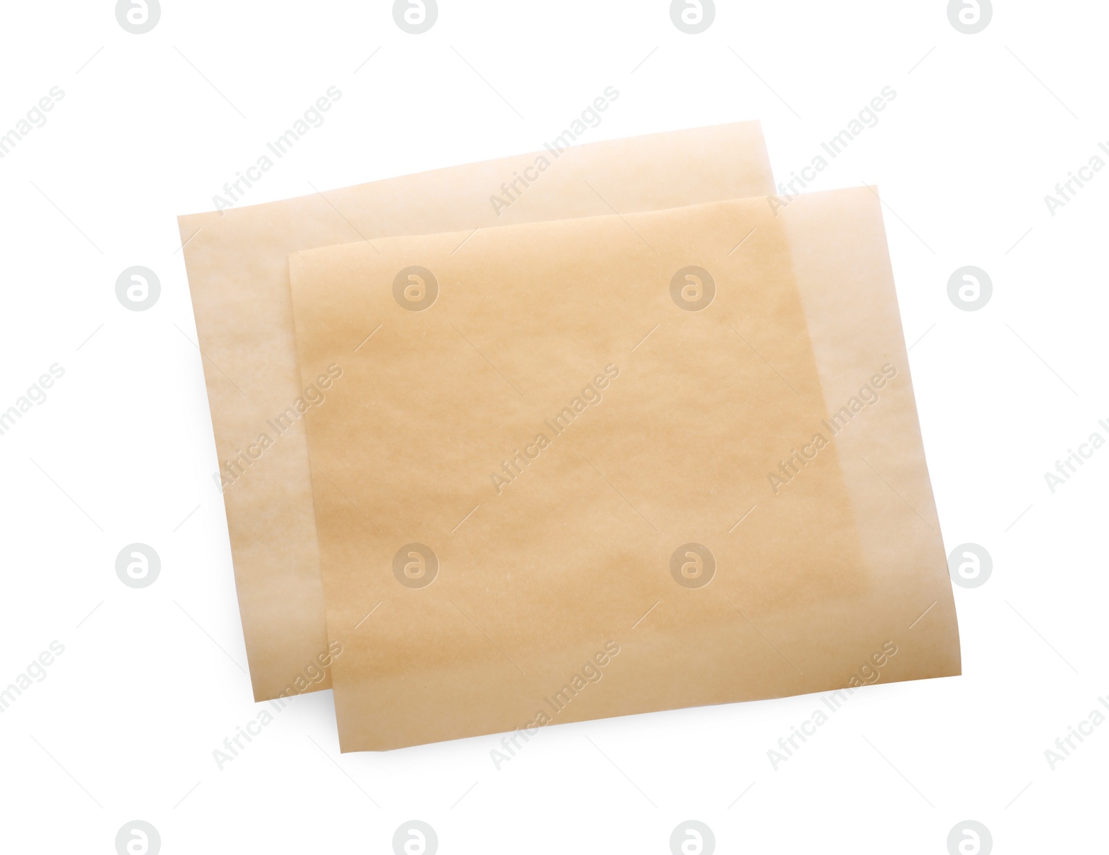 Photo of Sheets of baking paper isolated on white