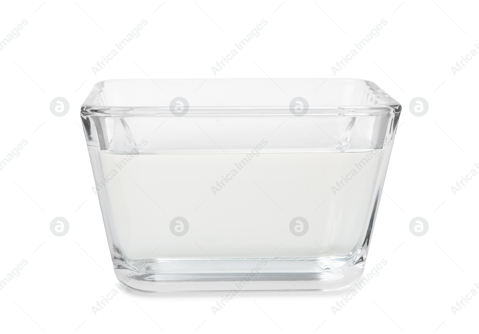 Photo of Vinegar in glass bowl isolated on white