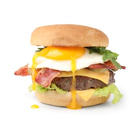 Photo of Delicious burger with fried egg isolated on white