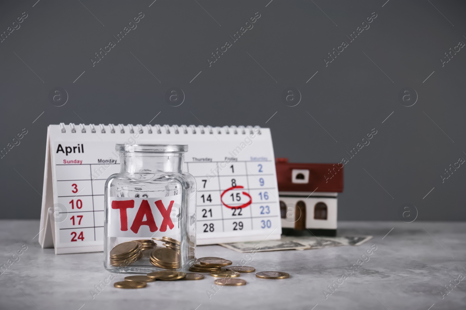 Photo of Composition with money and calendar on table. Tax time