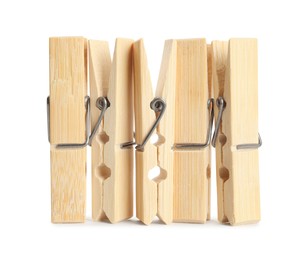 Photo of Set of wooden clothespins on white background