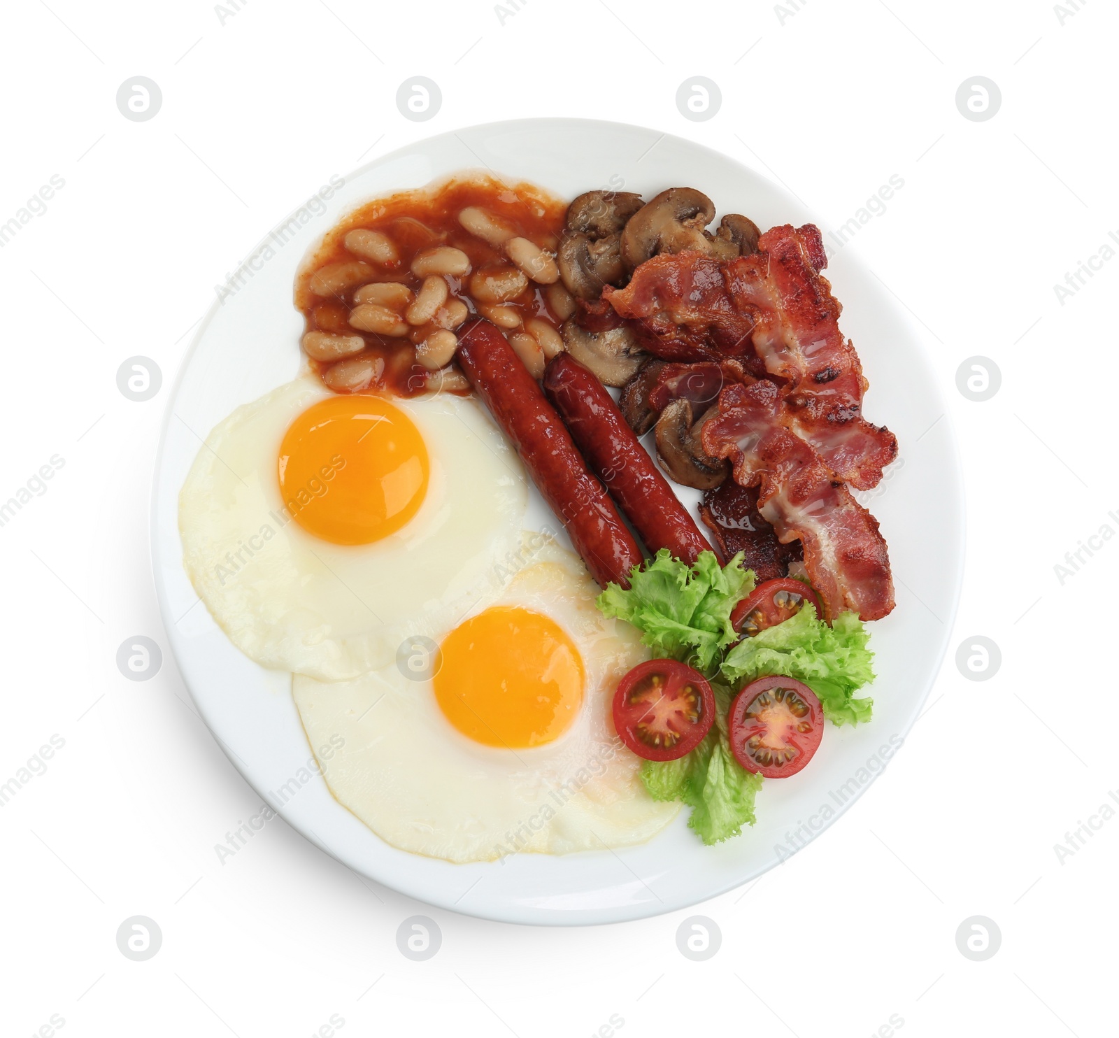 Photo of Delicious breakfast with sunny side up eggs isolated on white, top view