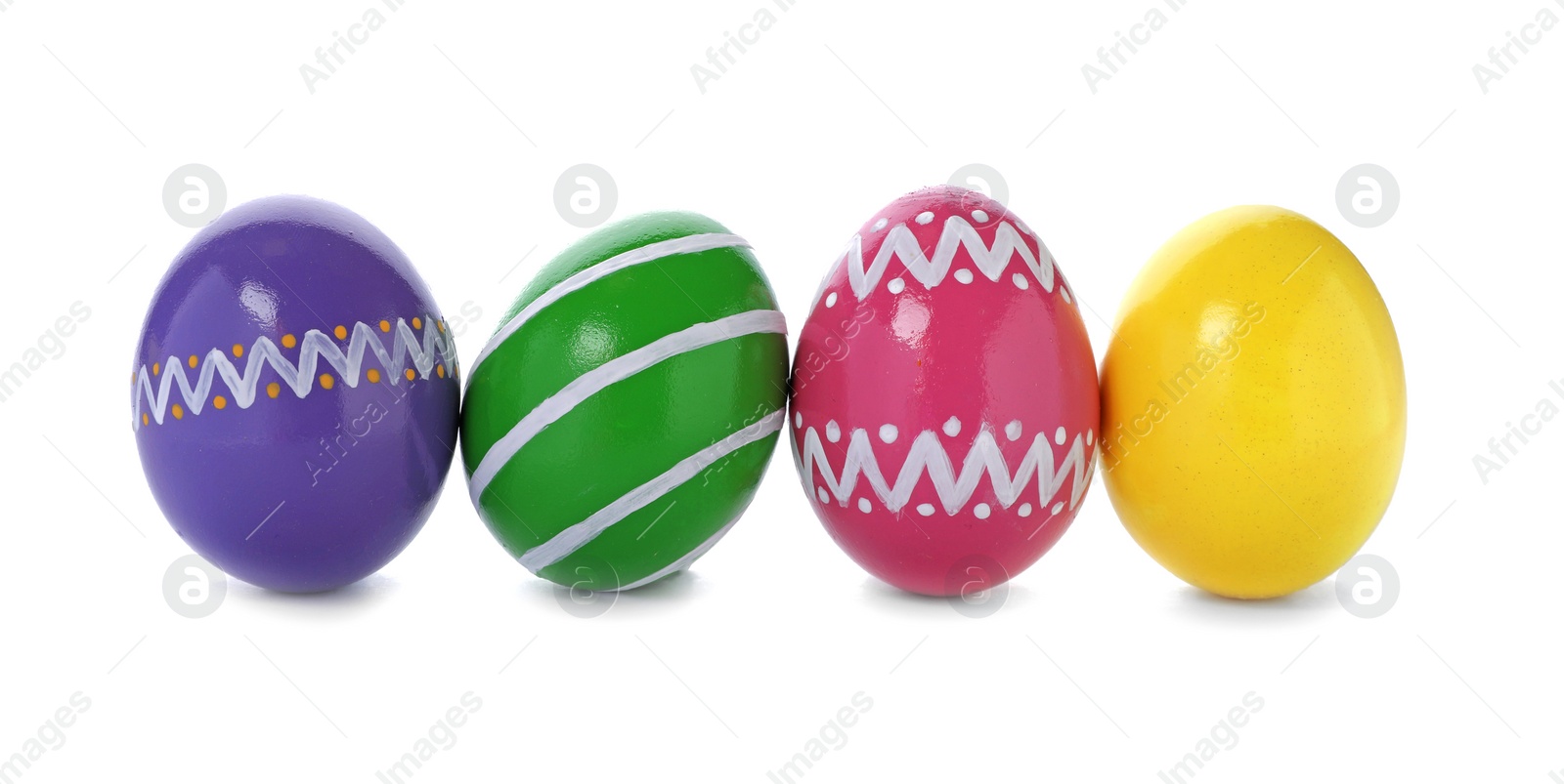 Photo of Decorated Easter eggs on white background. Festive tradition